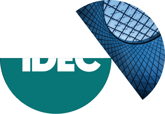 IDEC logo with a all glass building ceiling